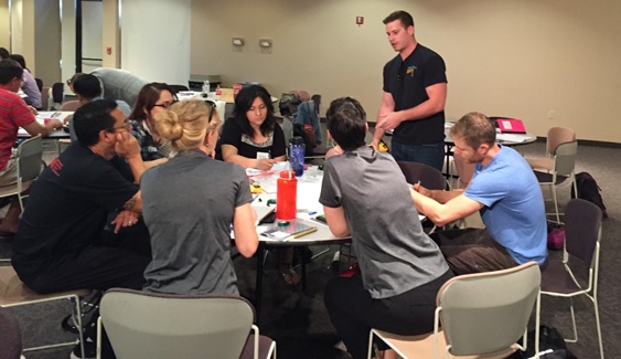 QESST Scholar Alex Killam working alongside teachers with solar technology at the MESA Workshop.